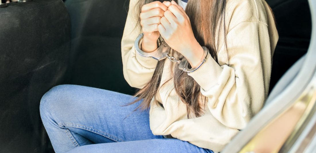 female in handcuffs hurto