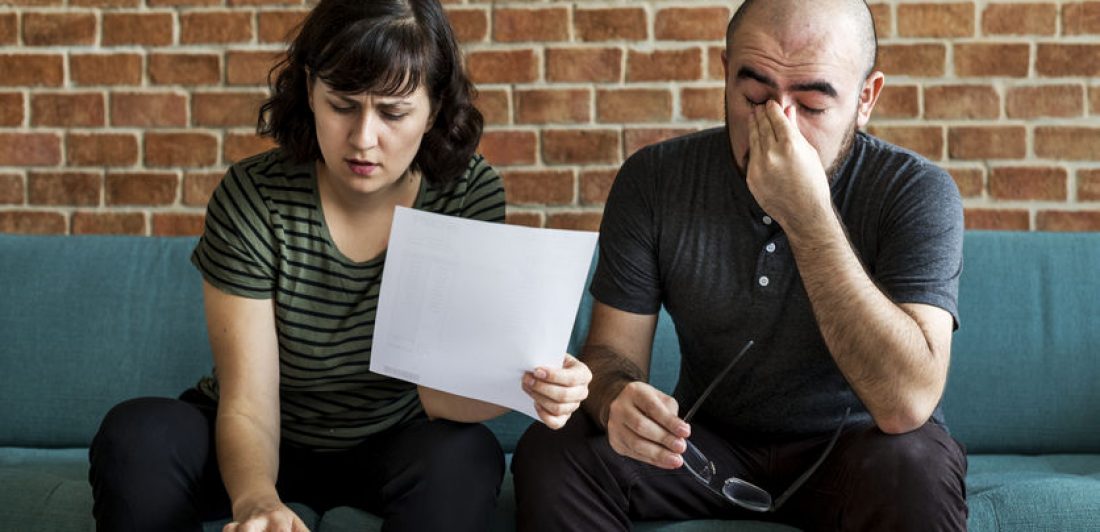 Couple managing the debt